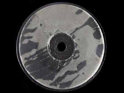 This wax-and-cardboard disc from 1885 contains a recording of Bell’s voice.  Photo courtesy of Richard Strauss, Smithsonian Institution.