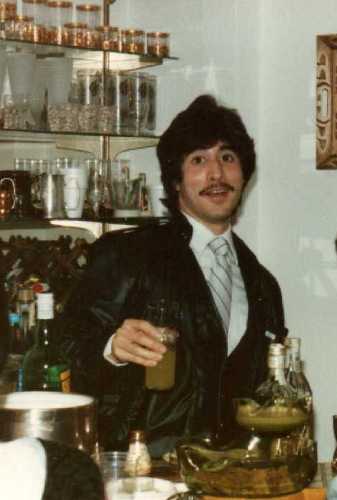 I commandeered the bar at the home of some long-time family friends on New Year’s Eve 1983.  My jacket was faux leather, but the hair was real!  When the hostess asked what speed she should set the blender to mix margaritas, ‘whip’ or ‘puree,’ I said, “Drunk.”