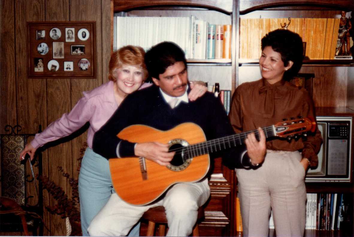 Another New Year’s party, with my mother clowning alongside the friends who often entertained us with a guitar and a song.  My mother just turned 81, but the couple left us more than three years ago.